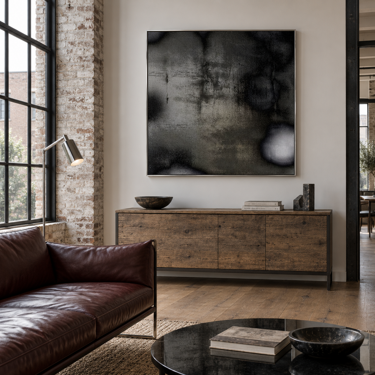 Charcoal Nocturne in a red leather loft lounge