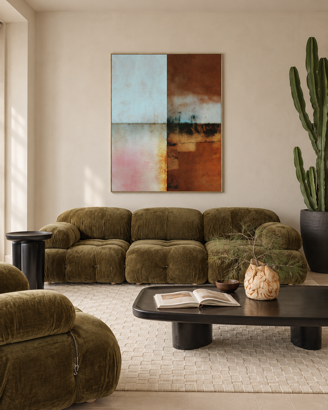 Blue and Umber Bands artwork above an olive velvet sofa